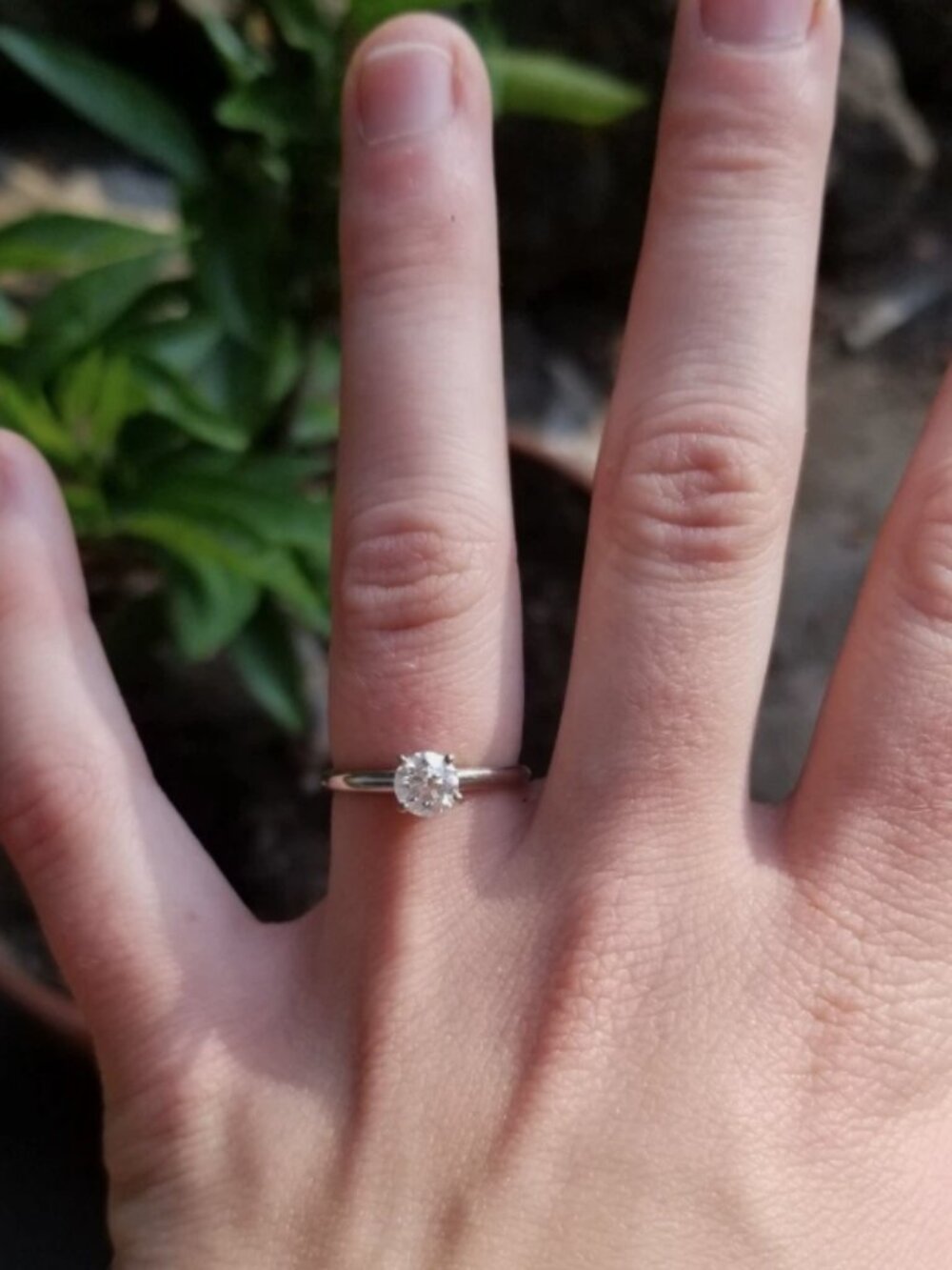 Round cut, engagement ring size 7, 0.72 carat certified diamond